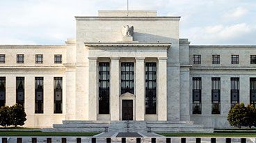 https://www.iese.edu/insight/wp-content/uploads/sites/3/2024/04/federal-reserve-building-front-perspective.jpg