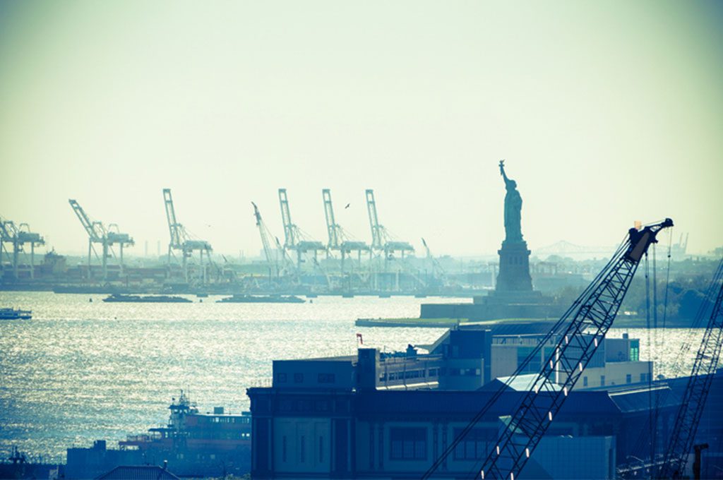 Statue of Liberty and New York City Port.