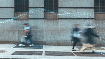 https://www.iese.edu/insight/wp-content/uploads/sites/3/2025/05/people-walking-tech.jpg