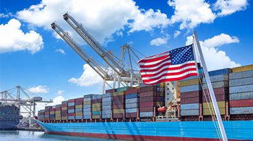 https://www.iese.edu/insight/wp-content/uploads/sites/3/2025/06/US-port-cargo-ship.jpg