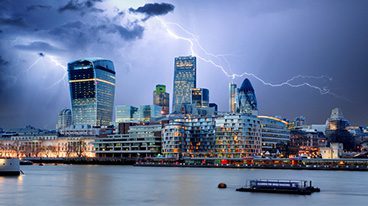https://www.iese.edu/insight/wp-content/uploads/sites/3/2025/07/london-skyline-lightning.jpg
