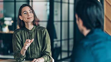 https://www.iese.edu/insight/wp-content/uploads/sites/3/2025/07/negotiation-conversation.jpg
