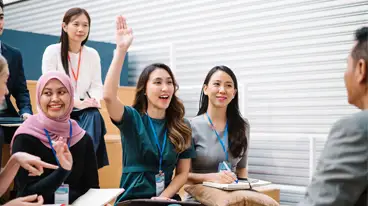 https://www.iese.edu/insight/wp-content/uploads/sites/3/2025/10/student-question-teacher-class.webp