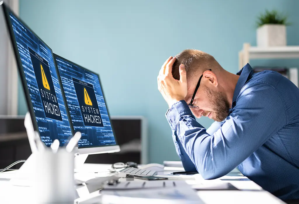 Office worker worried about a cyberattack