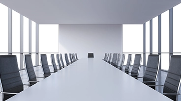 https://www.iese.edu/insight/wp-content/uploads/sites/3/2026/04/empty-meeting-room.webp