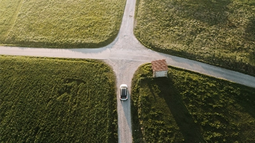 https://www.iese.edu/insight/wp-content/uploads/sites/3/2026/05/crossroads-car.webp