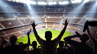 https://www.iese.edu/insight/wp-content/uploads/sites/3/2026/06/football-stadium-celebration.webp