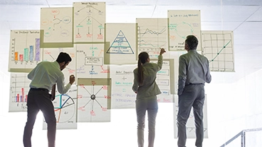 https://www.iese.edu/insight/wp-content/uploads/sites/3/2026/06/researchers-posters-data.webp