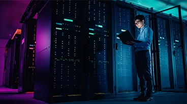 https://www.iese.edu/insight/wp-content/uploads/sites/3/2026/07/data-center-worker.webp